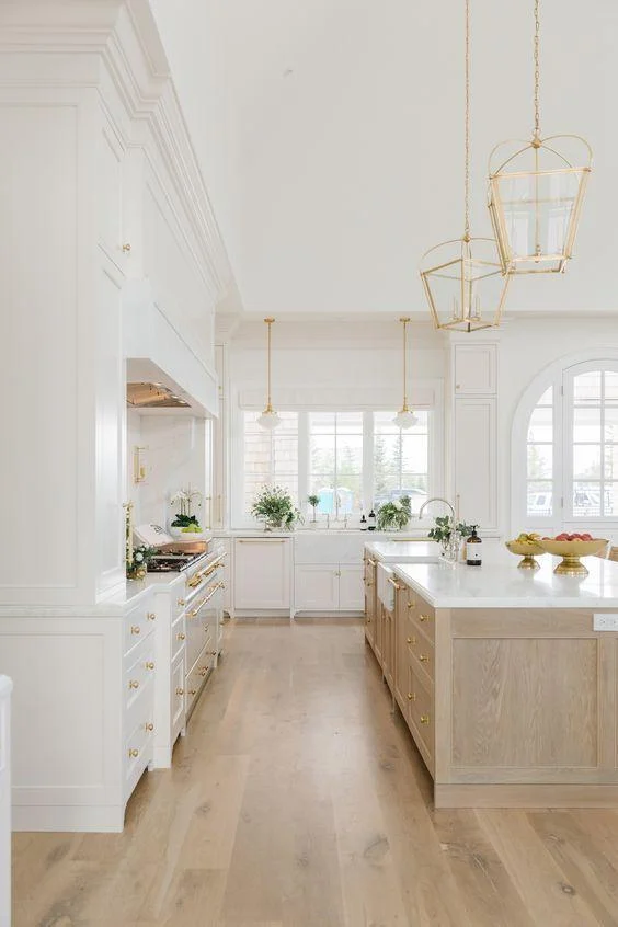 Love this beautiful kitchen design with a mix of white oak and white kitchen cabinets - cambridge home company - the cabinet gallery utah